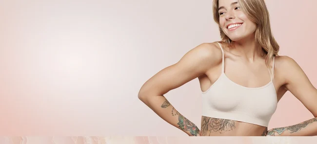 woman posing in nude bra