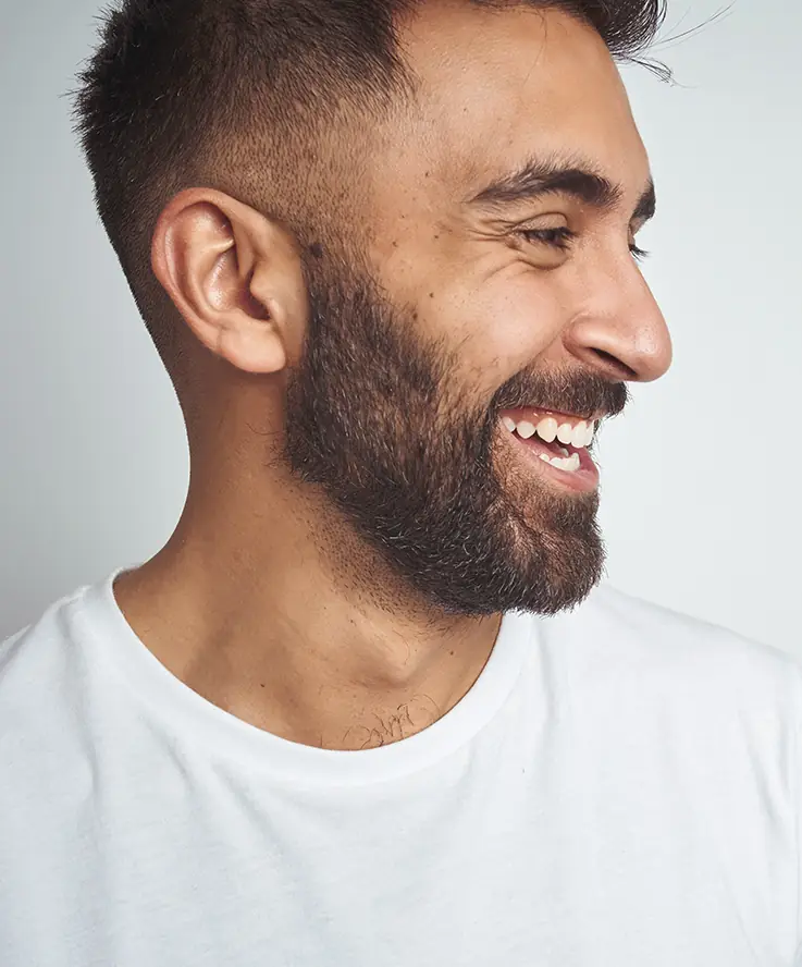 Side profile of cheerful man