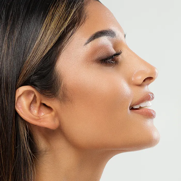 beautiful woman side profile showcasing nose after rhinoplasty