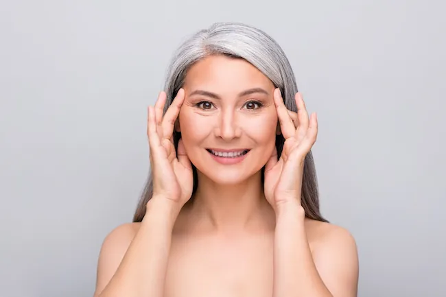 woman in her late 40s smiling